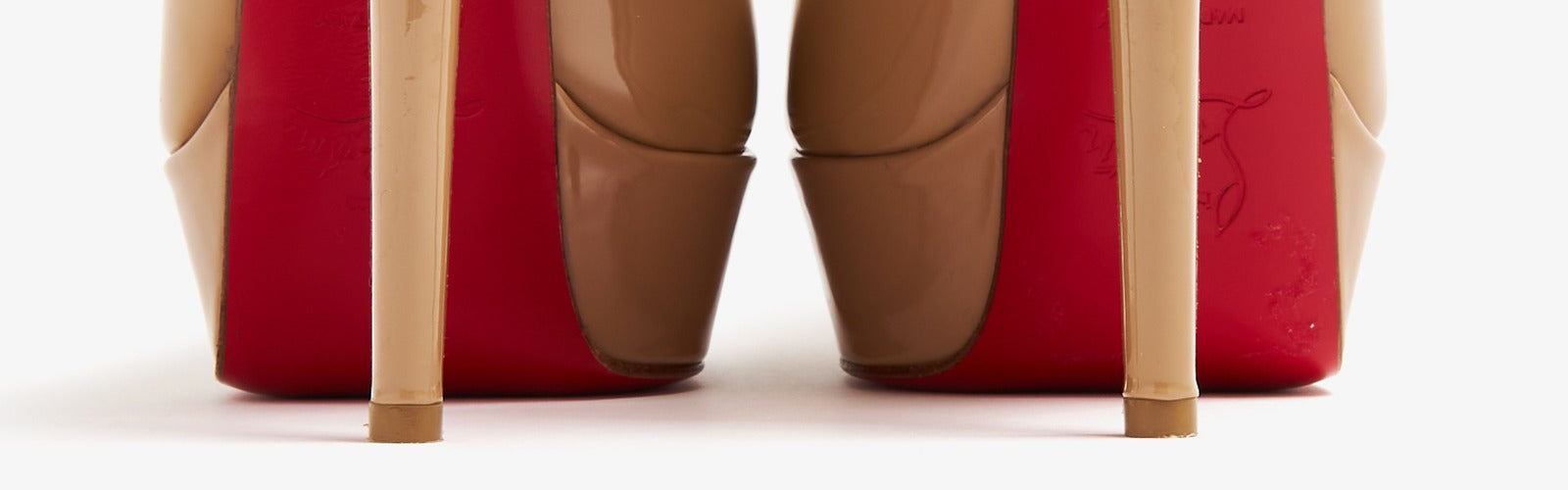 Christian Louboutin Bianca 140 platform pumps showing iconic red soles