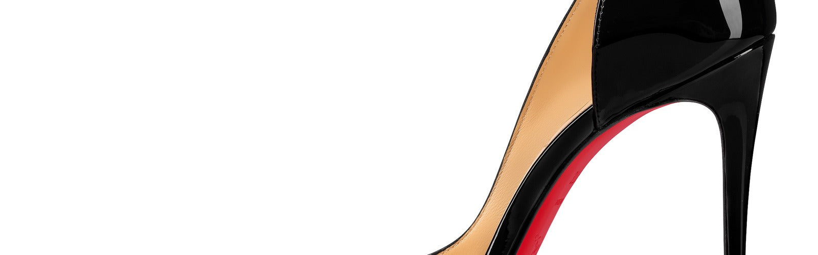 Christian Louboutin Iriza 100mm black patent leather — the d'orsay cut-out that defines the silhouette