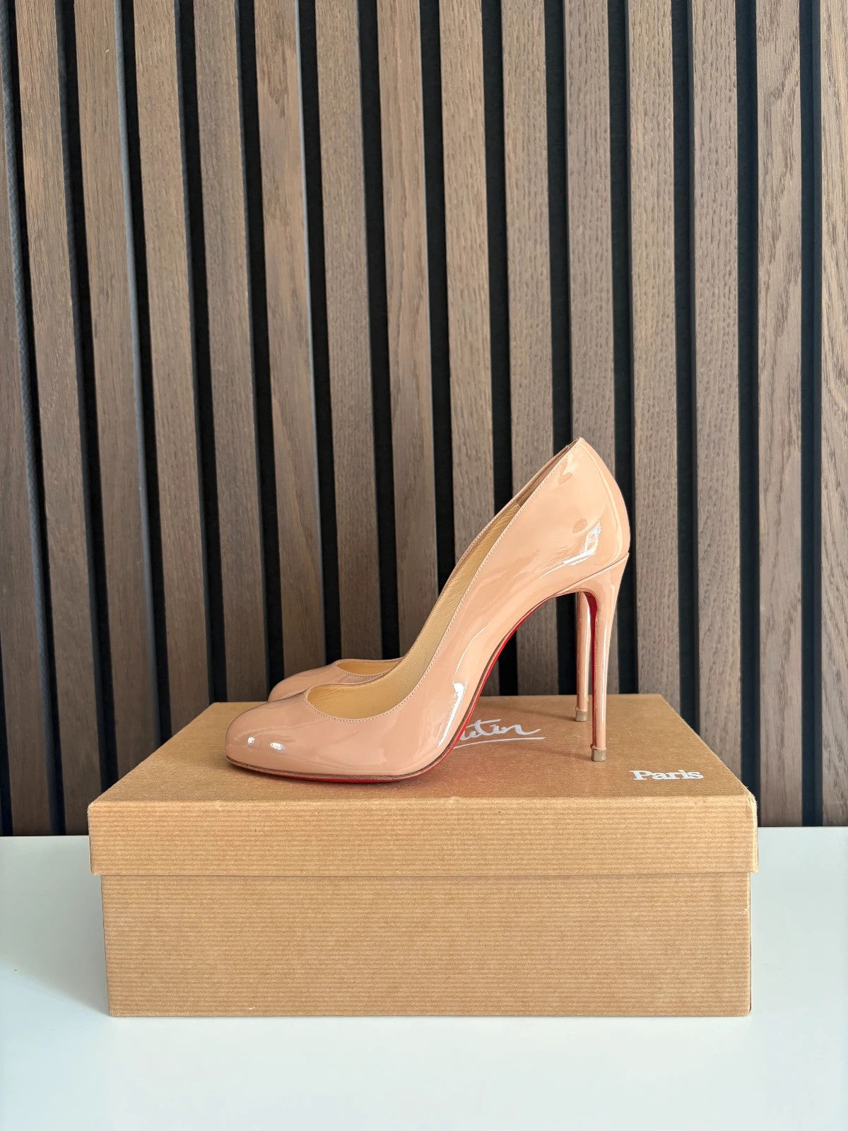 Christian Louboutin Dorissima Nude Christian Louboutin Dorissima 100 Nude Patent Leather Heels - main product view