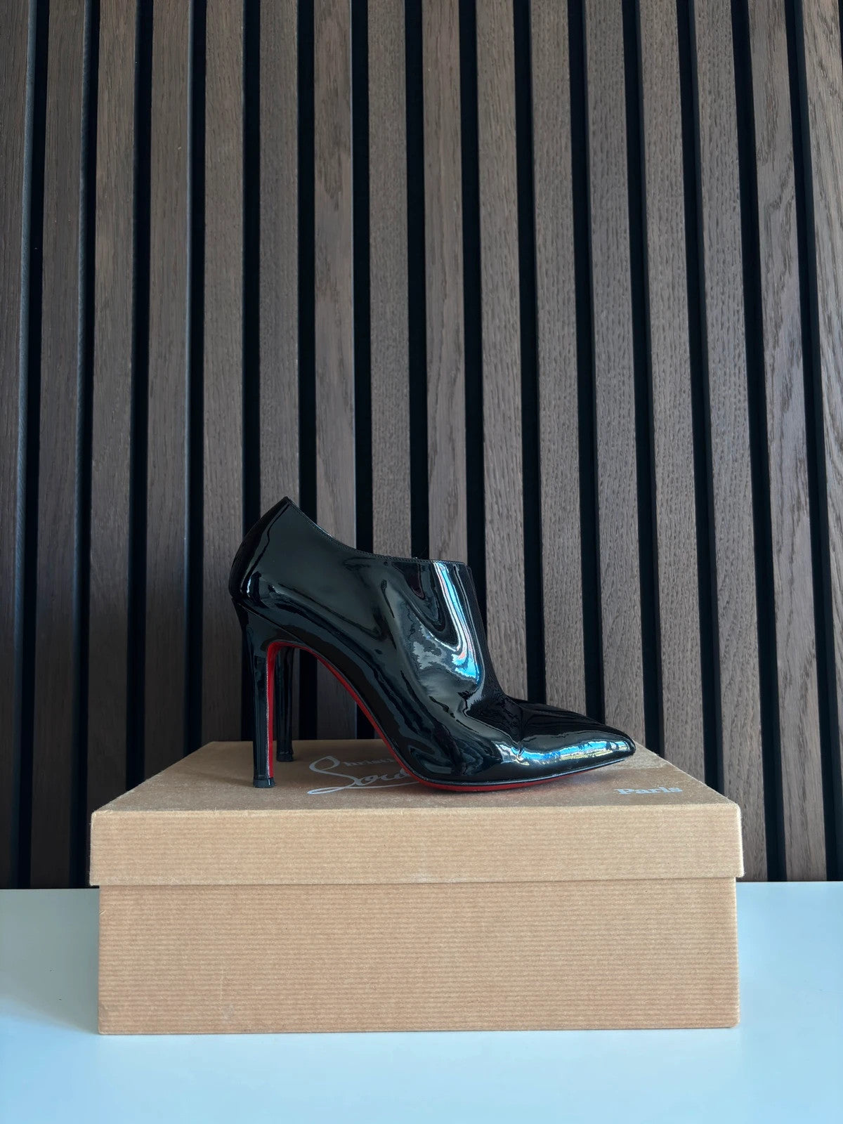 Christian Louboutin Dahlia Black (image 2) Christian Louboutin Dahlia 100 Black Patent Leather Ankle Boots - alternate angle