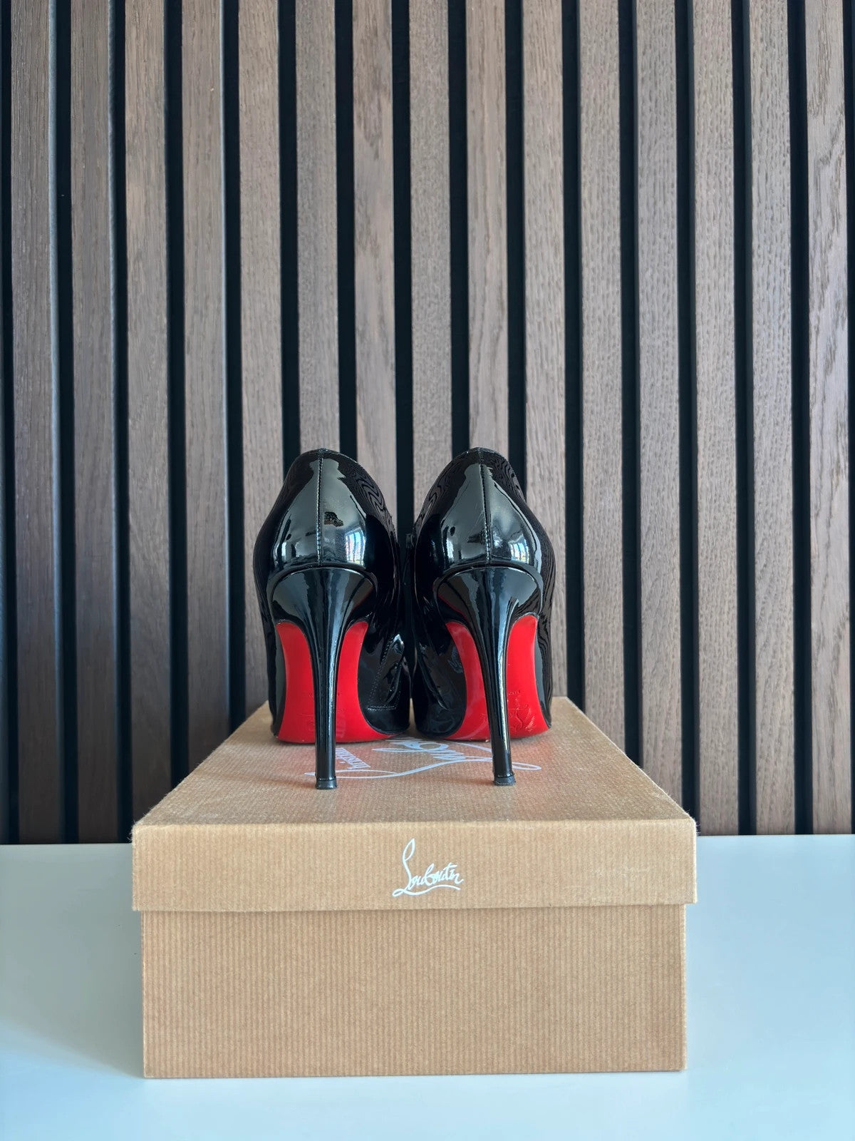 Christian Louboutin Dahlia Black (image 4) Christian Louboutin Dahlia 100 Black Patent Leather Ankle Boots - red sole detail