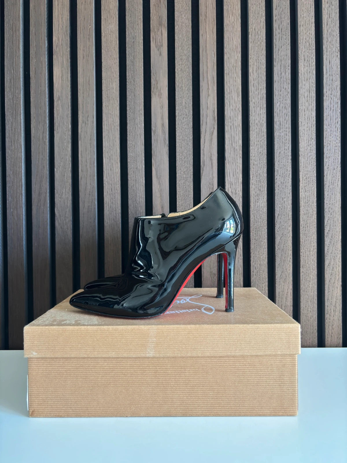 Christian Louboutin Dahlia Black Christian Louboutin Dahlia 100 Black Patent Leather Ankle Boots - main product view