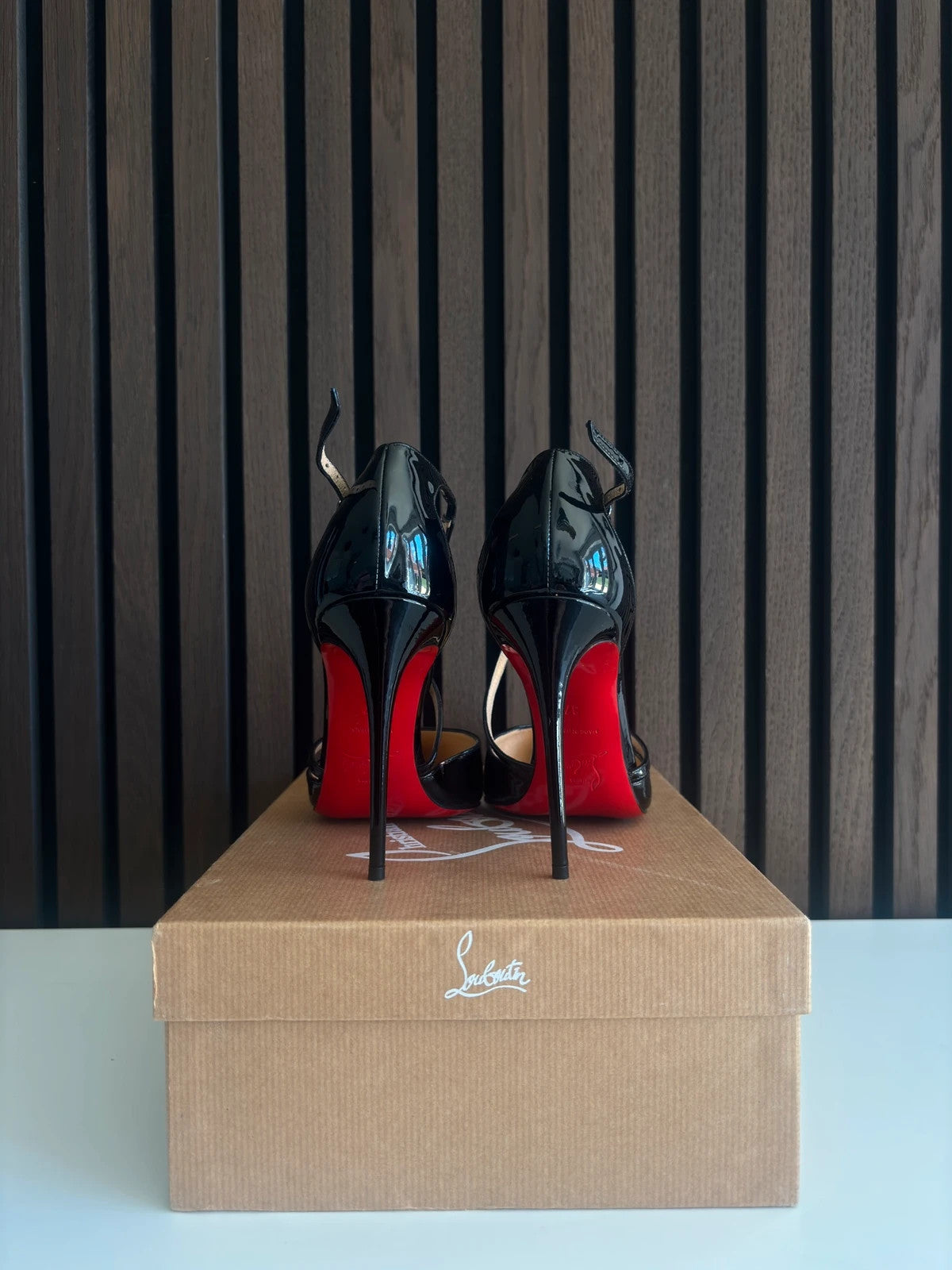 Christian Louboutin Cross Blake Black (image 4) Christian Louboutin Cross Blake 100 Black Patent Leather Heels - red sole detail