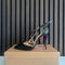Christian Louboutin Cross Blake 100 Black Patent Leather Heels