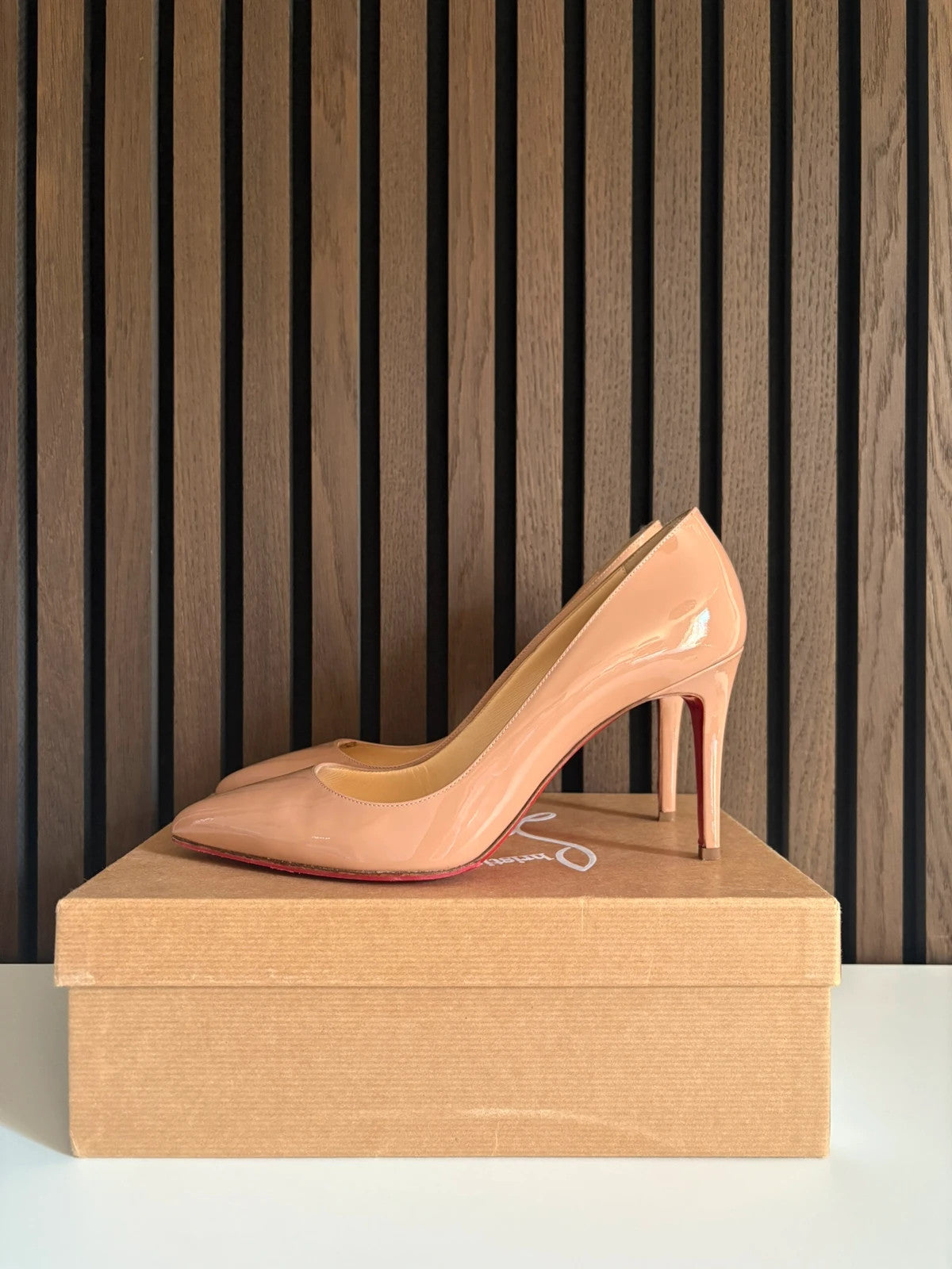 Christian Louboutin Pigalle Nude (image 4) Christian Louboutin Pigalle 100 Nude Patent Leather Heels - red sole detail