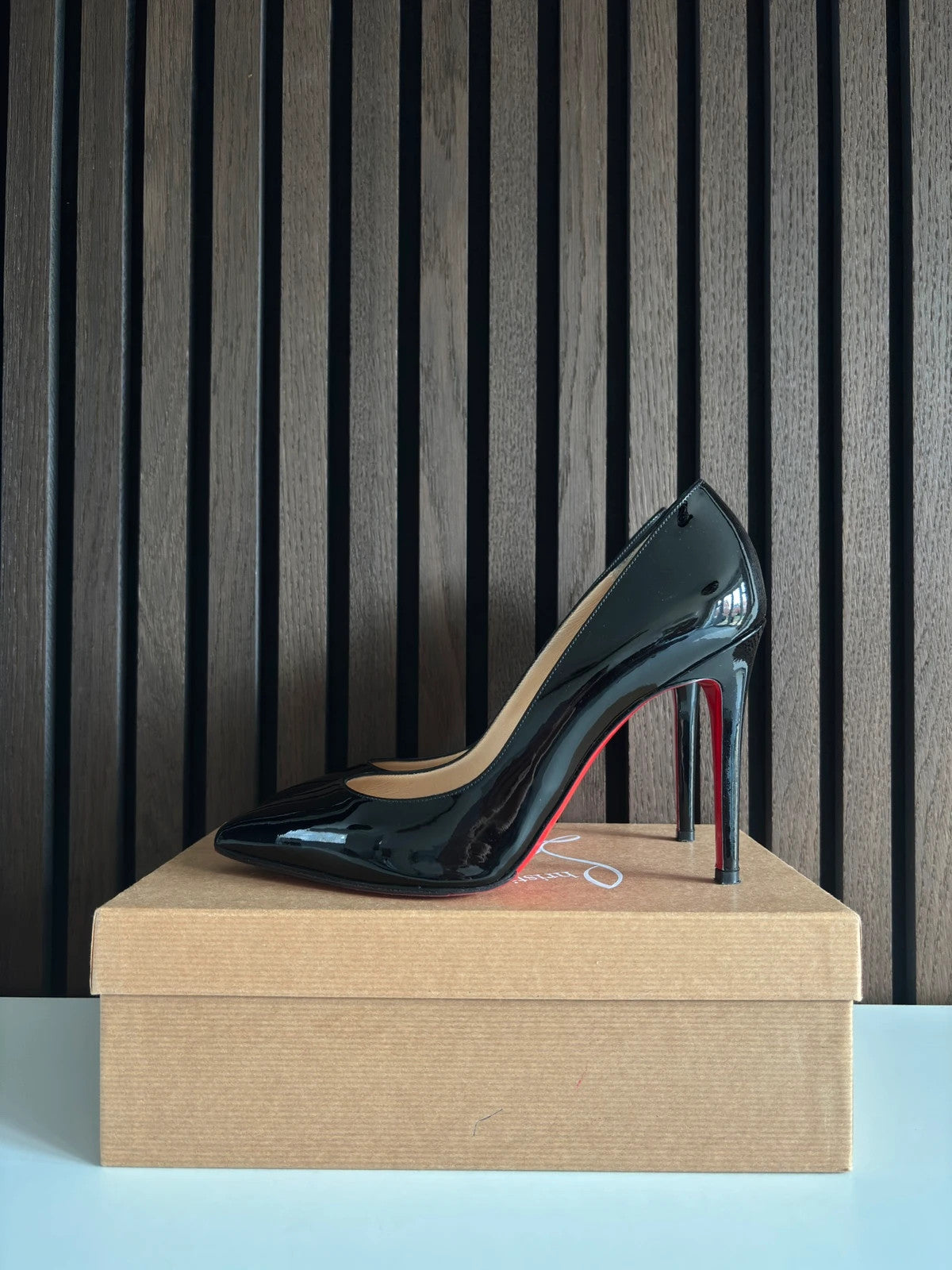 Christian Louboutin Pigalle Black (image 4) Christian Louboutin Pigalle 100 Black Patent Leather Heels - red sole detail