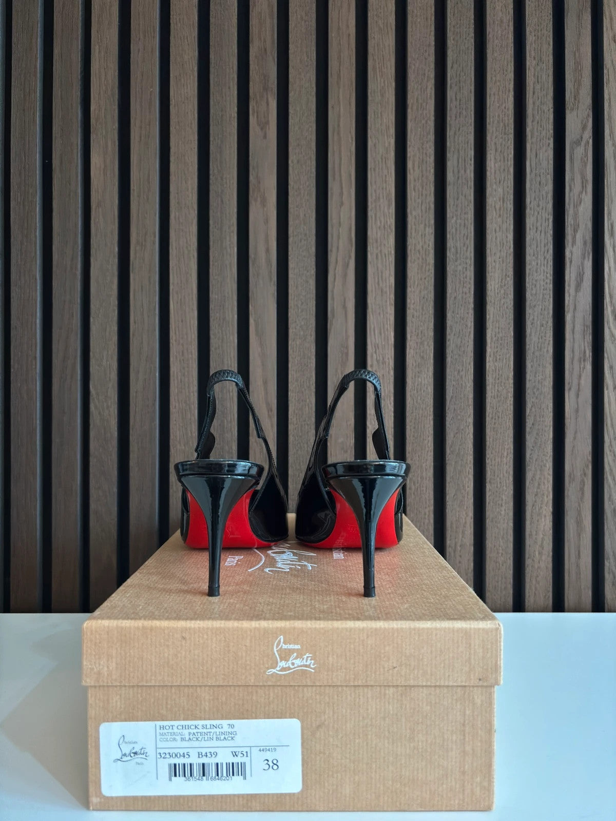 Christian Louboutin Hot Chick Black (image 4) Christian Louboutin Hot Chick 100 Black Patent Leather Heels - red sole detail