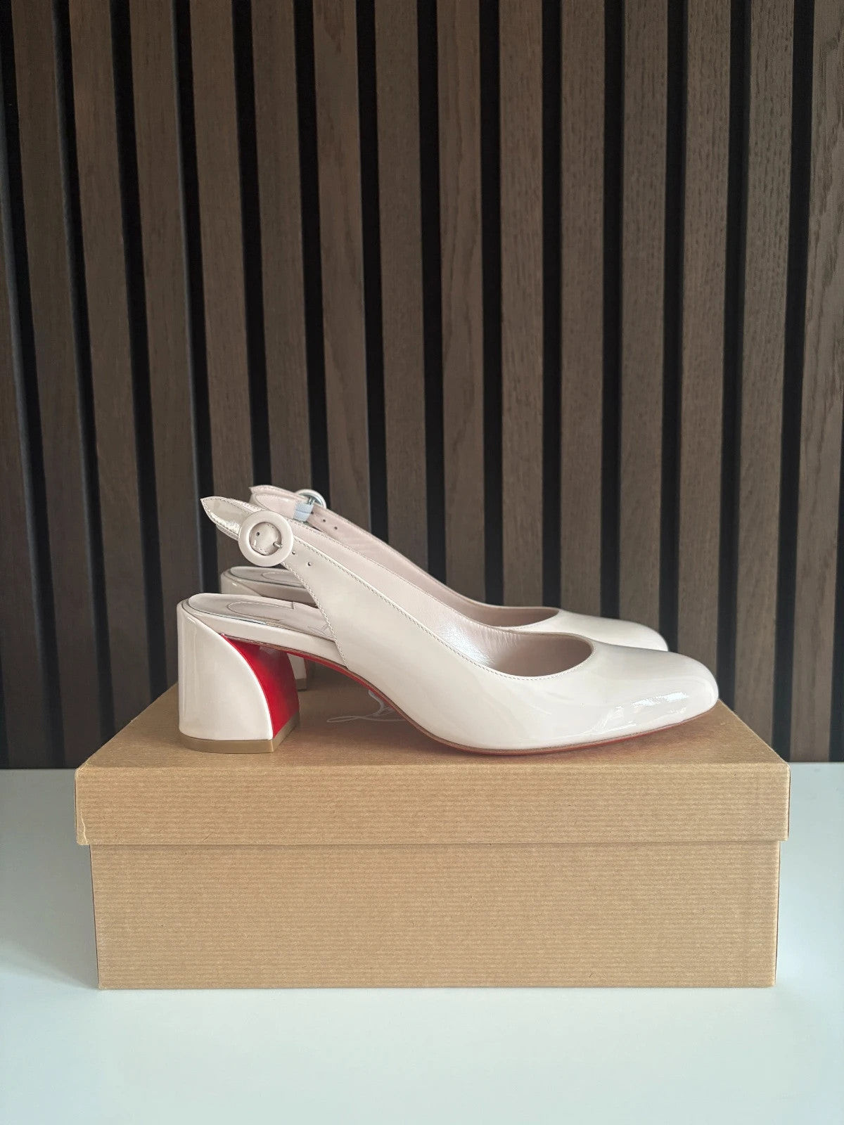Christian Louboutin So Jane Cream (image 4) Christian Louboutin So Jane 55 Patent Leather Sling Heels - red sole detail