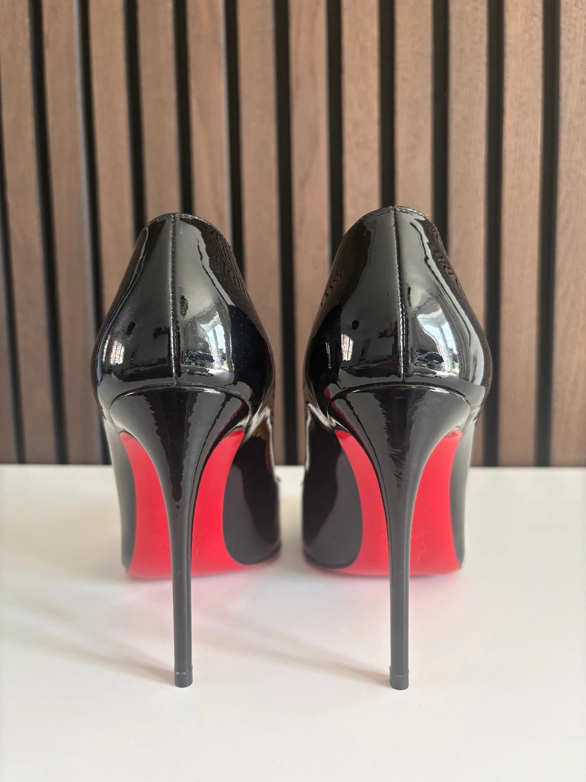 Christian Louboutin Hot Chick Black (image 4) Christian Louboutin Hot Chick 100 Patent Leather Heels - red sole detail