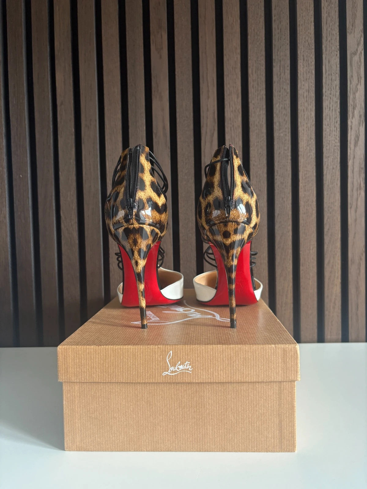 Christian Louboutin Confusa White (image 3) Christian Louboutin Confusa 100 White Patent Leather T-strap Heels - detail view