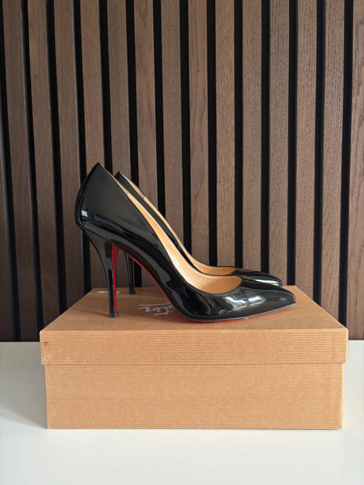 Christian Louboutin Batignolles Black (image 4) Christian Louboutin Batignolles 100 Black Patent Leather Heels - red sole detail