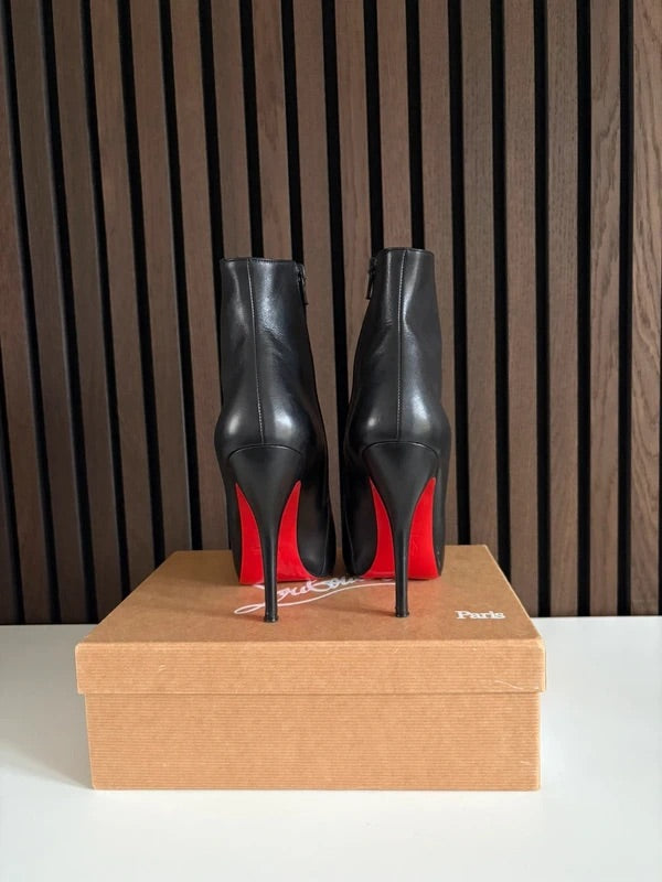 Christian Louboutin Black Patent Leather, pre-owned authenticated UK, heel and sole detail Christian Louboutin Black Leather Ankle Boots (EU 37 / UK 4) - detail view