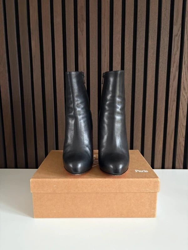 Christian Louboutin Black Patent Leather, pre-owned authenticated UK, interior view Christian Louboutin Black Leather Ankle Boots (EU 37 / UK 4) - red sole detail