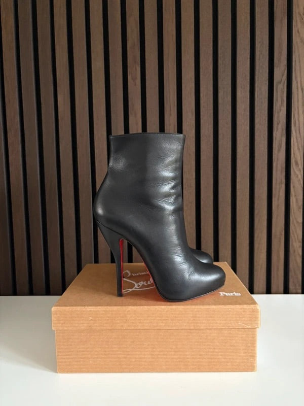 Christian Louboutin Black Patent Leather, pre-owned authenticated UK, side view Christian Louboutin Black Leather Ankle Boots (EU 37 / UK 4) - alternate angle