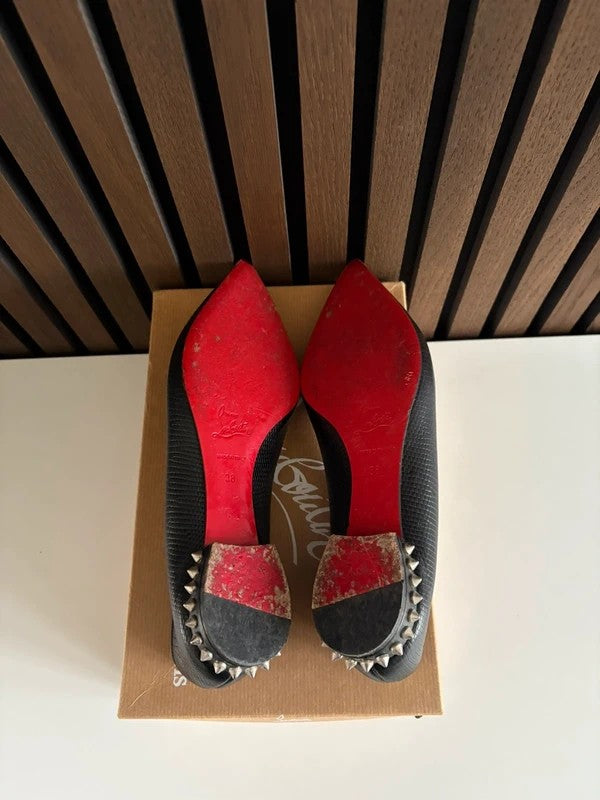 Christian Louboutin Hall Flat 100mm heel Black Leather, pre-owned authenticated UK, close-up detail Christian Louboutin Hall Flat Nappa Black Leather Spikes (EU 38 / UK 5) - heel and construction