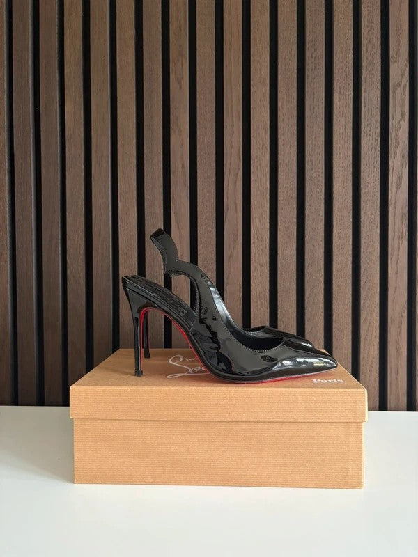 Christian Louboutin Hot Chick 100mm heel Black Patent Leather, pre-owned authenticated UK, side view Christian Louboutin Hot Chick Sling Black Patent Leather Heels (EU 37 / UK 4) - alternate angle