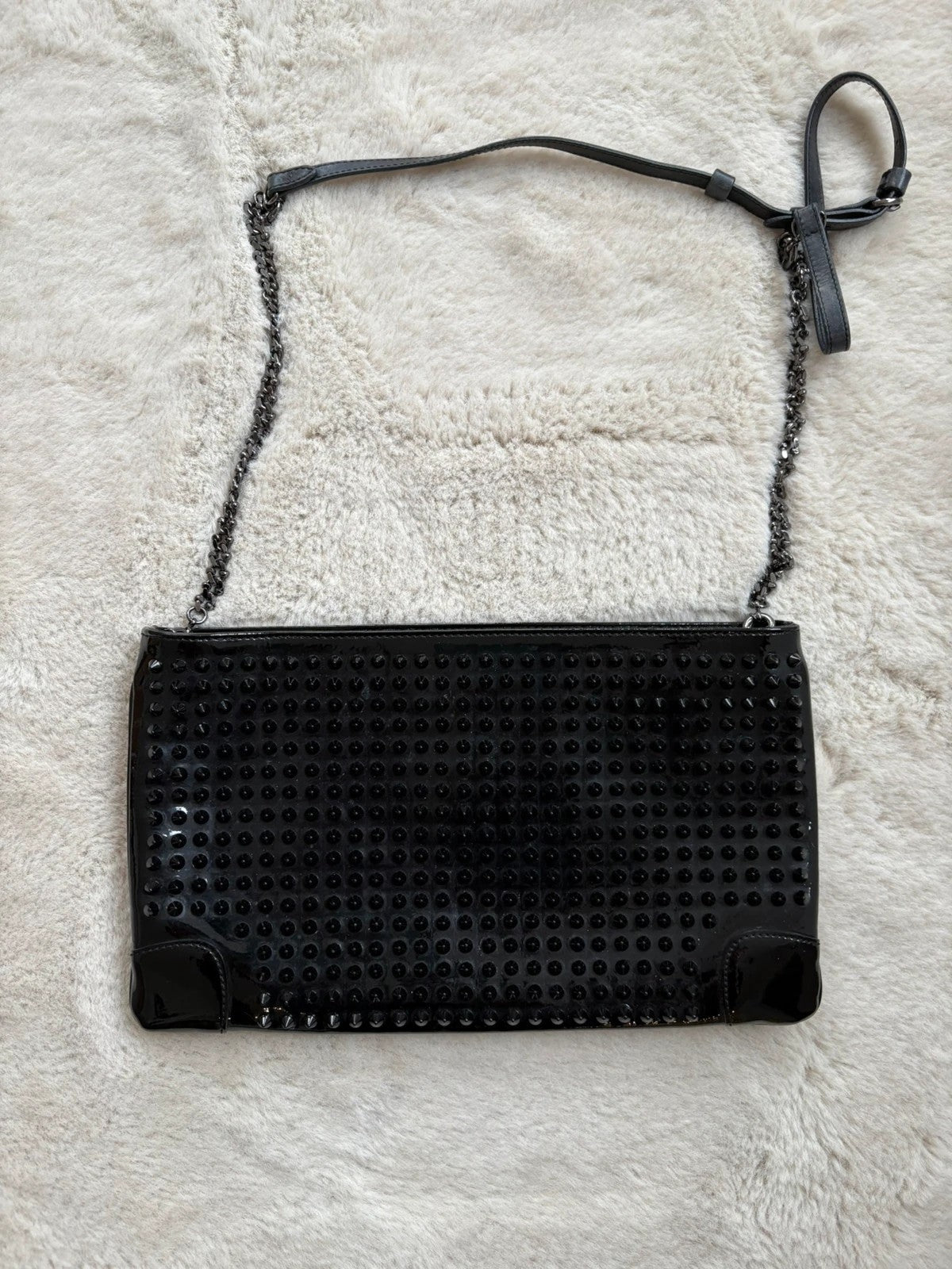 Christian Louboutin Loubiposh 100 Leather Black - Side Profile Christian Louboutin Loubiposh Leather Black Bag - alternate angle