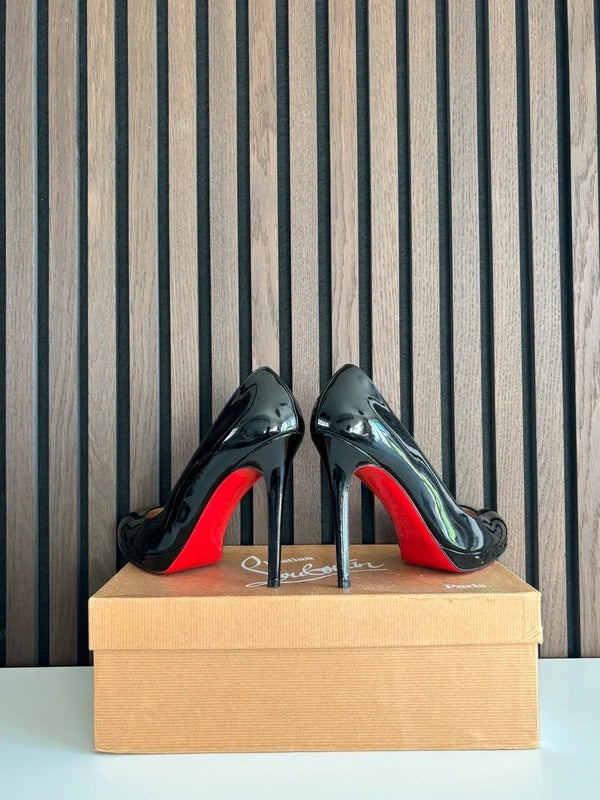 Christian Louboutin Simple Pump 85mm heel Black Leather, pre-owned authenticated UK, close-up detail Christian Louboutin Simple Pump Black Leather Heels (EU 38.5 / UK 5.5) - heel and construction