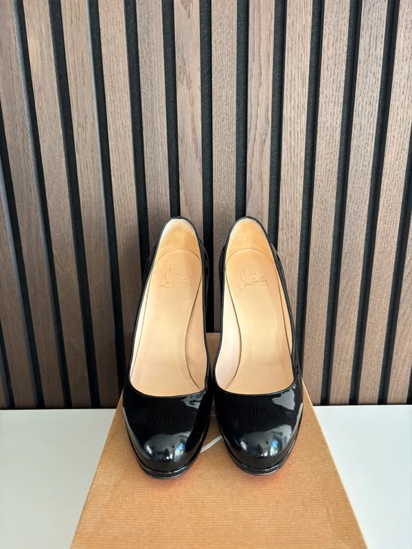 Christian Louboutin Simple Pump 85mm heel Black Leather, pre-owned authenticated UK, side view Christian Louboutin Simple Pump Black Leather Heels (EU 38.5 / UK 5.5) - alternate angle