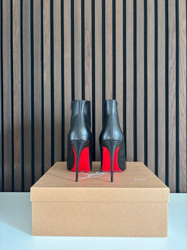 Christian Louboutin So Kate 100mm heel Black Leather, pre-owned authenticated UK, interior view Christian Louboutin So Kate Black Leather Ankle Boots (EU 39.5 / UK 6.5) - red sole detail