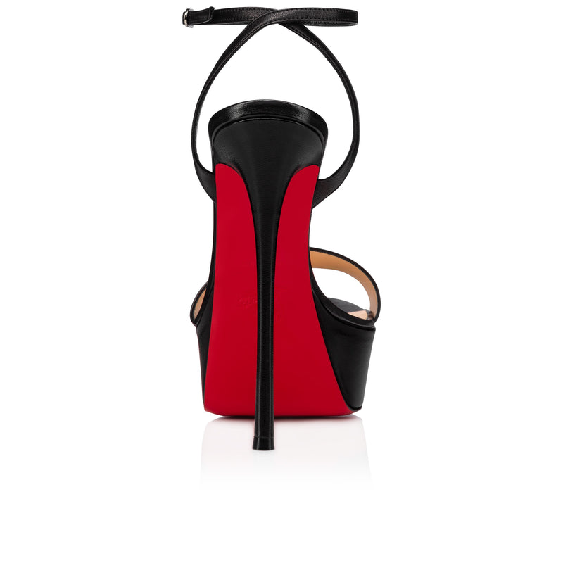 Christian Louboutin Loubi Queen Alta on a white background